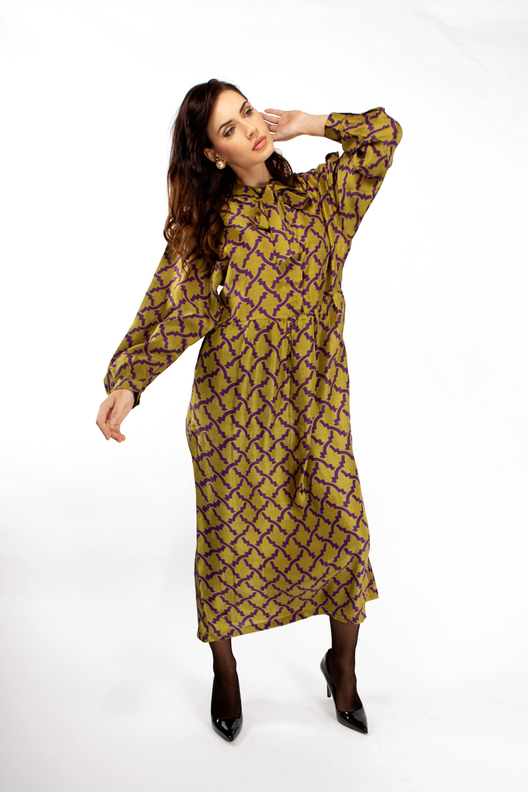 green silk dress with long sleeves and pussy bow by Asneh